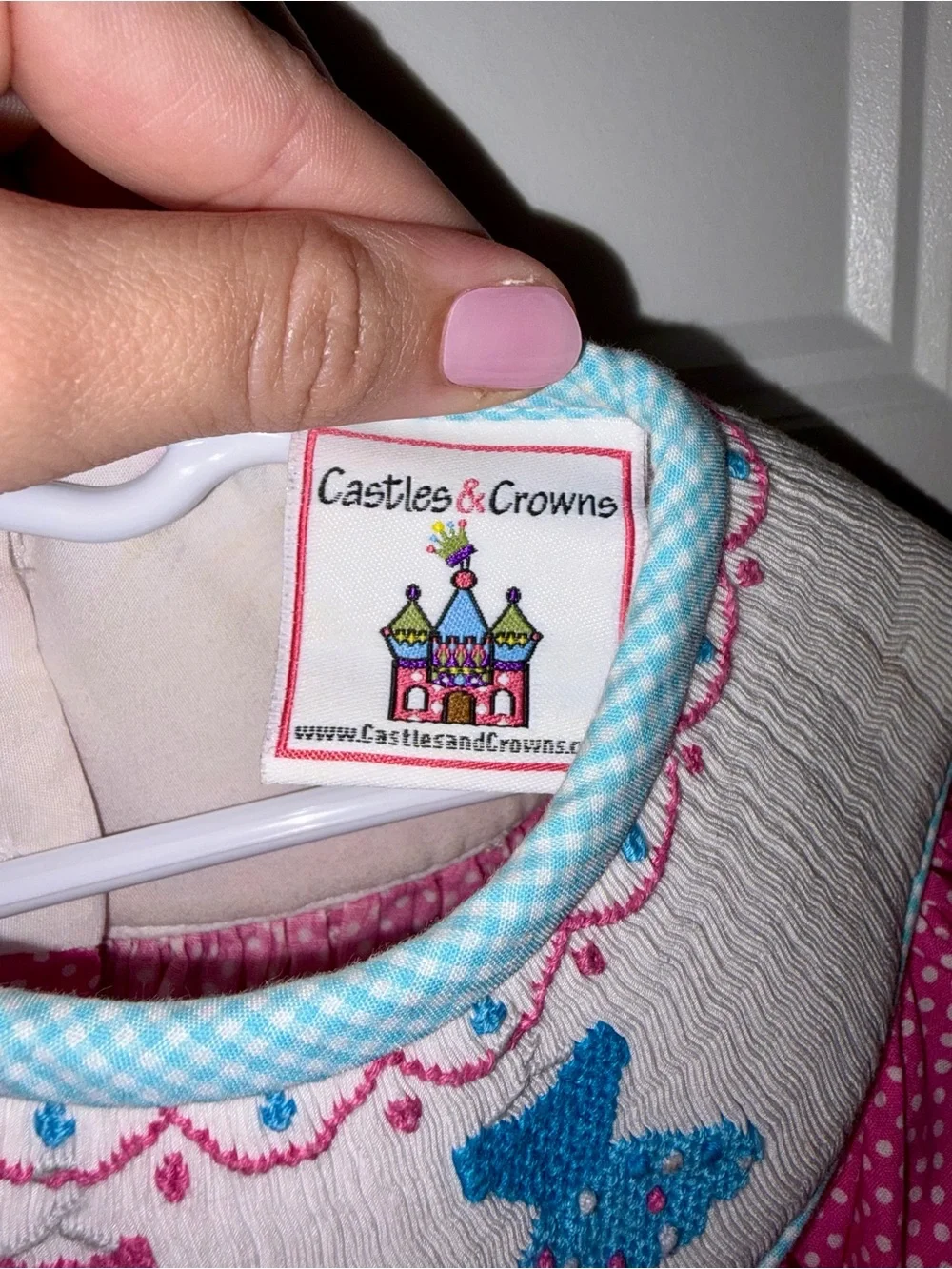 Castle & Crowns - Girls Pink Polka Dot Smocked dress with Blue Trim
